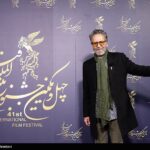استقبال خبرنگاران از میهمان ویژه «کت چرمی»؛ عفو رهبر انقلاب شادی را به جشنواره فیلم فجر آورد
