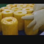 فرایند تولید و بسته بندی آناناس در یک کارخانه (فیلم)