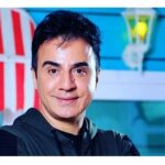 عکس | تصویر عجیب عموپورنگ از بغل کردن یک خرس زرد!