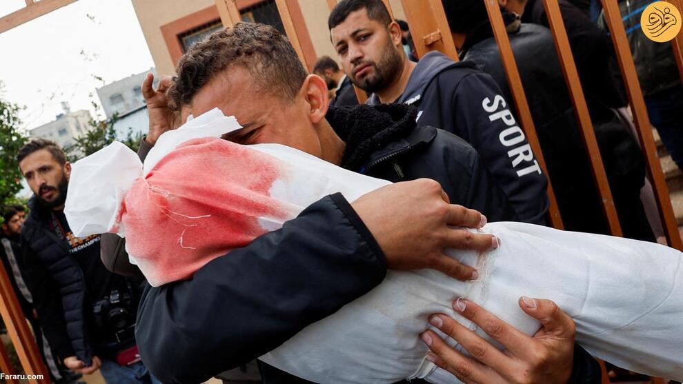 (تصاویر) دفن قربانیان جنگ غزه در گور دسته جمعی