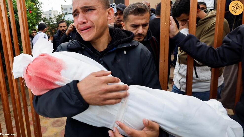 (تصاویر) دفن قربانیان جنگ غزه در گور دسته جمعی