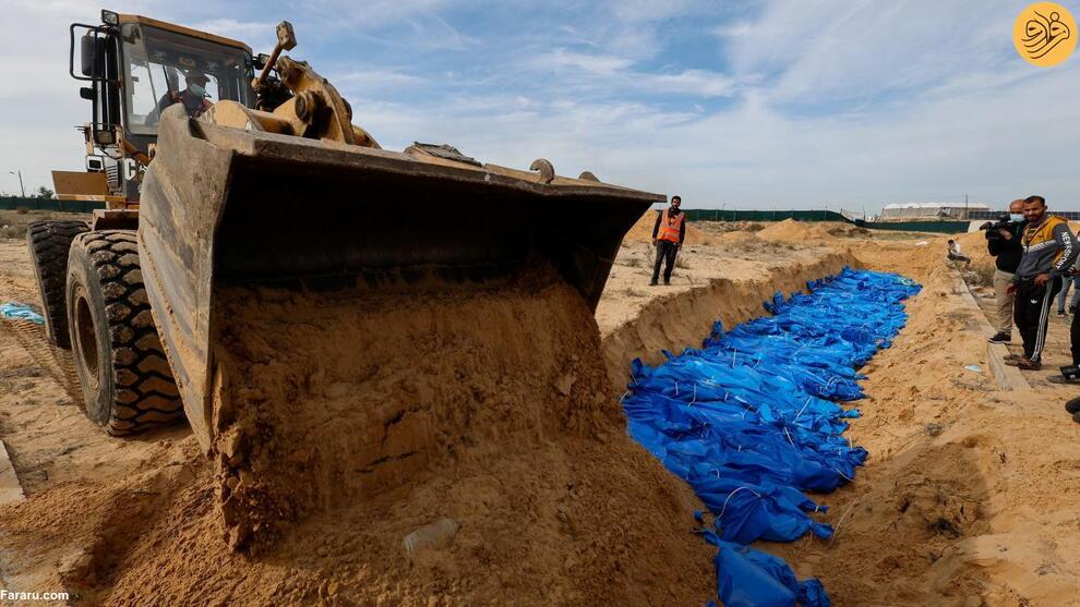 (تصاویر) دفن قربانیان جنگ غزه در گور دسته جمعی