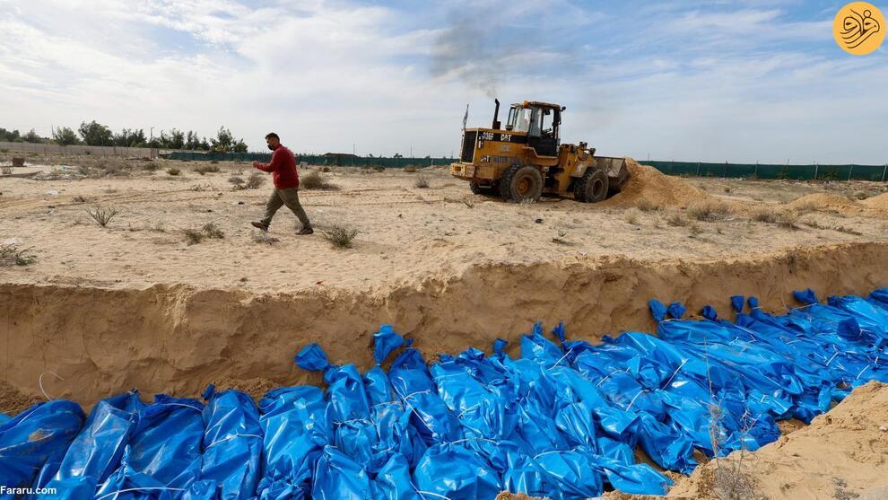 (تصاویر) دفن قربانیان جنگ غزه در گور دسته جمعی