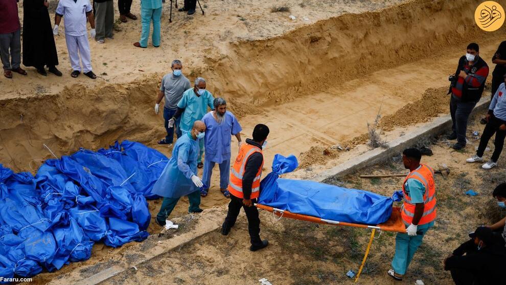 (تصاویر) دفن قربانیان جنگ غزه در گور دسته جمعی