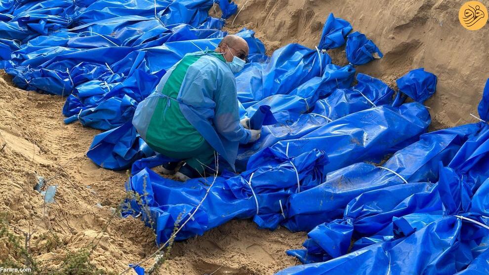 (تصاویر) دفن قربانیان جنگ غزه در گور دسته جمعی