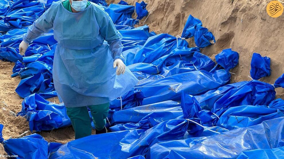 (تصاویر) دفن قربانیان جنگ غزه در گور دسته جمعی