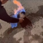 حرکت جنون‌آمیز یک جوان ؛ ریختن بنزین روی توپ و زدن ضربه سر (فیلم)