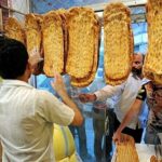 عکس | تصاویری از گاز گرفتن گوش یک بر سر برداشتن نان بربری در بازار تهران!