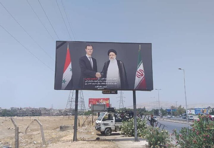 رئیس‌جمهور شهید ایران و بشار اسد در خیابان‌های دمشق