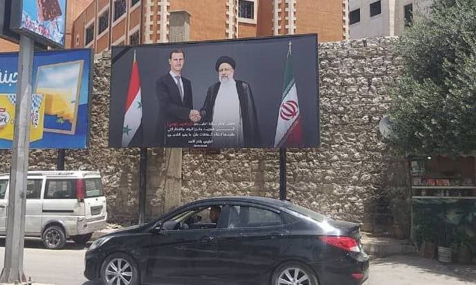 رئیس‌جمهور شهید ایران و بشار اسد در خیابان‌های دمشق