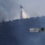 (تصاویر) مهار آتش‌سوزی گسترده مناطق جنگلی با هلیکوپتر